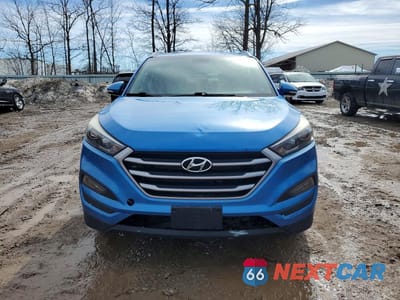 Piąte zdjęcie samochodu w środku: 2017 HYUNDAI TUCSON SE PLUS VIN:KM8J3CA44HU482602 - miniatura
