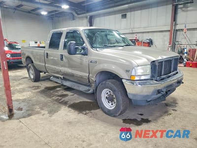 Czwarte zdjęcie samochodu z boku: 2002 FORD F350 SRW SUPER DUTY VIN:1FTSW31S62EA75672 - miniatura