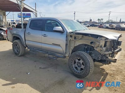 Czwarte zdjęcie samochodu z boku: 2017 TOYOTA TACOMA TRD OFF-ROAD VIN:3TMCZ5AN0HM090740 - miniatura