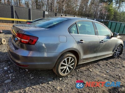Trzecie zdjęcie samochodu z tyłu: 2017 VOLKSWAGEN JETTA SE VIN:3VWDB7AJ7HM372551 - miniatura