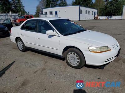 Czwarte zdjęcie samochodu z boku: 2001 HONDA ACCORD LX VIN:JHMCG56431C015784 - miniatura