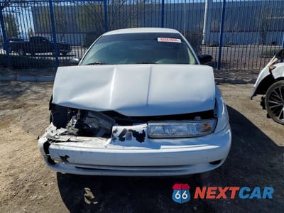Piąte zdjęcie samochodu w środku: 1998 SATURN SL2 VIN:1G8ZJ5272WZ251094 - miniatura