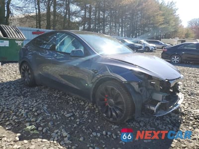 Czwarte zdjęcie samochodu z boku: 2022 TESLA MODEL Y VIN:7SAYGDEF3NF459599 - miniatura