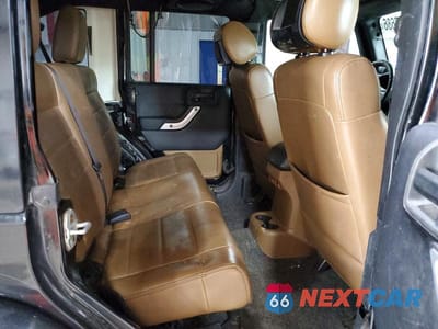 Zdjęcie 11 z 13 samochodu: 2012 JEEP WRANGLER UNLIMITED SAHARA VIN:1C4BJWEG6CL191585 - miniatura