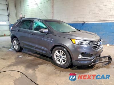 Czwarte zdjęcie samochodu z boku: 2020 FORD EDGE SEL VIN:2FMPK4J98LBB22293 - miniatura