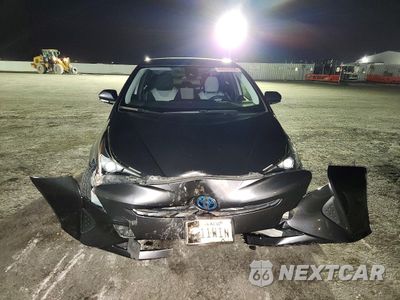 Piąte zdjęcie samochodu w środku: 2017 TOYOTA PRIUS TWO VIN:JTDKBRFUXH3542072 - miniatura