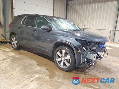 Czwarte zdjęcie samochodu z boku: 2019 CHEVROLET TRAVERSE LT VIN:1GNEVHKW2KJ119373 - miniatura