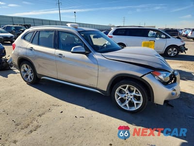 Czwarte zdjęcie samochodu z boku: 2014 BMW X1 XDRIVE28I VIN:WBAVL1C59EVY18845 - miniatura