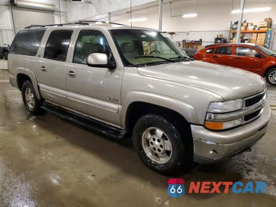 Czwarte zdjęcie samochodu z boku: 2000 CHEV SUBURBAN VIN:3GNFK16T4YG148422 - miniatura