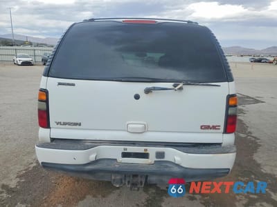 Zdjęcie 6 z 14 samochodu: 2004 GMC YUKON DENALI VIN:1GKEK63U34J267056 - miniatura