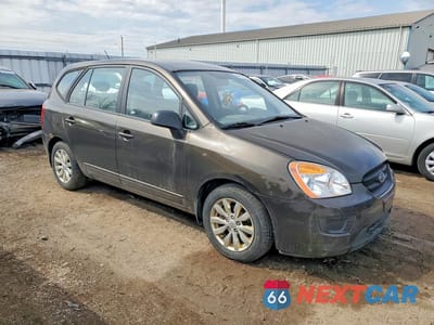 Czwarte zdjęcie samochodu z boku: 2010 KIA RONDO LX VIN:KNAHG8A80A7302105 - miniatura
