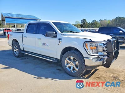 Czwarte zdjęcie samochodu z boku: 2022 FORD F150 SUPERCREW VIN:1FTFW1E52NFA51491 - miniatura