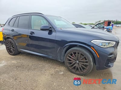 Czwarte zdjęcie samochodu z boku: 2023 BMW X5 XDRIVE40I VIN:5UXCR6C08P9R63377 - miniatura
