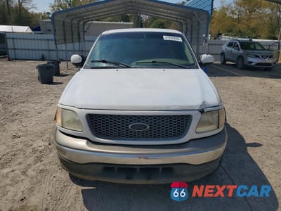 Piąte zdjęcie samochodu w środku: 2001 FORD F150 VIN:2FTRX17L71CA11449 - miniatura