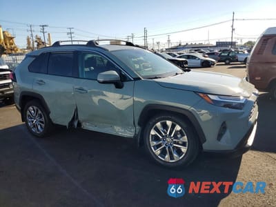 Czwarte zdjęcie samochodu z boku: 2022 TOYOTA RAV4 XLE PREMIUM VIN:2T3A1RFV5NW300516 - miniatura