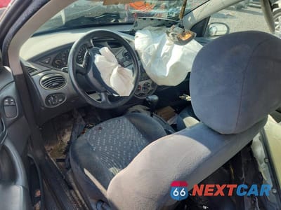 Zdjęcie 8 z 11 samochodu: 2002 FORD FOCUS ZX3 VIN:3FAFP31322R228672 - miniatura