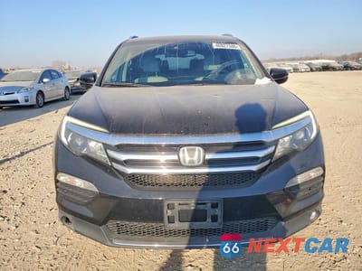 Piąte zdjęcie samochodu w środku: 2017 HONDA PILOT TOURING VIN:5FNYF6H96HB018507 - miniatura