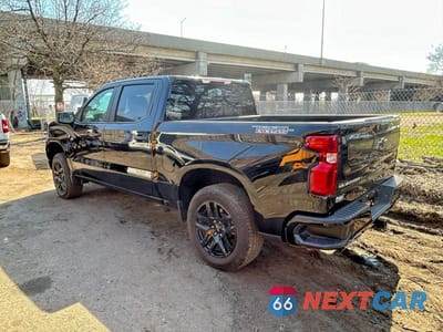 Trzecie zdjęcie samochodu z tyłu: 2024 CHEVROLET SILVERADO K1500 TRAIL BOSS CUSTOM VIN:3GCUDCE86RG359836 - miniatura