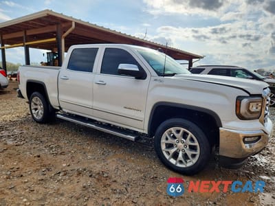 Czwarte zdjęcie samochodu z boku: 2016 GMC SIERRA K1500 SLT VIN:3GTU2NEC6GG273820 - miniatura