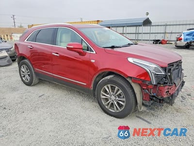 Czwarte zdjęcie samochodu z boku: 2023 CADILLAC XT5 PREMIUM LUXURY VIN:1GYKNCR48PZ137267 - miniatura