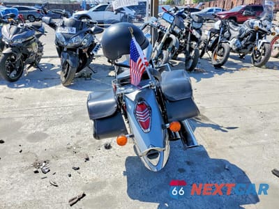 Czwarte zdjęcie samochodu z boku: 2005 HONDA VTX1300 R VIN:1HFSC52495A200220 - miniatura