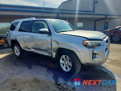 Czwarte zdjęcie samochodu z boku: 2014 TOYOTA 4RUNNER SR5 VIN:JTEZU5JR7E5069067 - miniatura
