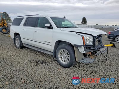Czwarte zdjęcie samochodu z boku: 2015 GMC YUKON XL K1500 SLT VIN:1GKS2HKC9FR177423 - miniatura