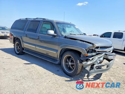 Czwarte zdjęcie samochodu z boku: 2002 CHEVROLET SUBURBAN K1500 VIN:1GNFK16T12J187345 - miniatura