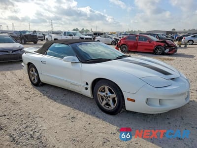 Czwarte zdjęcie samochodu z boku: 2001 PONTIAC FIREBIRD VIN:2G2FS32KX12119036 - miniatura