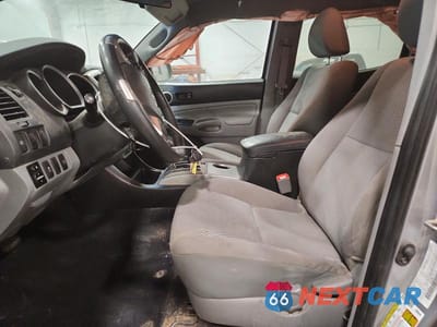 Zdjęcie 7 z 12 samochodu: 2014 TOYOTA TACOMA V6 VIN:3TMMU4FN5EM070811 - miniatura