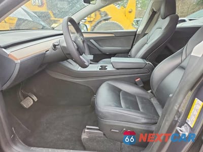 Zdjęcie 7 z 12 samochodu: 2023 TESLA MODEL Y VIN:7SAYGDEE2PF863309 - miniatura