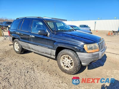 Czwarte zdjęcie samochodu z boku: 2002 JEEP GRAND CHEROKEE LAREDO VIN:1J4GW48S72C151553 - miniatura