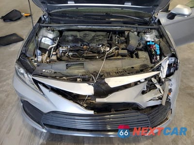 Zdjęcie 11 z 12 samochodu: 2022 TOYOTA CAMRY HYBRID LE VIN:4T1C31AKXNU577544 - miniatura