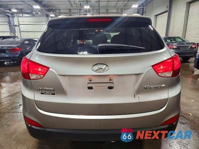 Zdjęcie 6 z 12 samochodu: 2013 HYUNDAI TUCSON GLS VIN:KM8JU3AC6DU547593 - miniatura