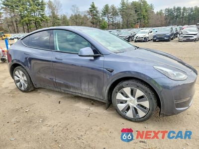Czwarte zdjęcie samochodu z boku: 2023 TESLA MODEL Y VIN:7SAYGDEE2PF863309 - miniatura