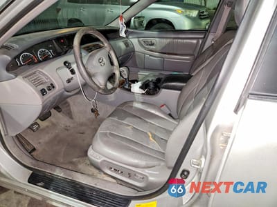 Zdjęcie 7 z 14 samochodu: 2002 TOYOTA AVALON XLS VIN:4T1BF28B22U212592 - miniatura