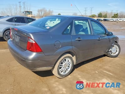 Trzecie zdjęcie samochodu z tyłu: 2007 FORD FOCUS ZX4 VIN:1FAHP34NX7W344633 - miniatura