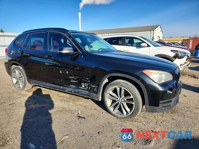 Czwarte zdjęcie samochodu z boku: 2013 BMW X1 XDRIVE28I VIN:WBAVL1C50DVR91538 - miniatura