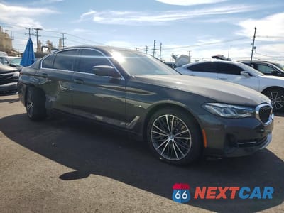 Czwarte zdjęcie samochodu z boku: 2022 BMW 530E VIN:WBA13AG03NCH77642 - miniatura