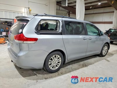 Trzecie zdjęcie samochodu z tyłu: 2014 TOYOTA SIENNA XLE 8-PASSENGER VIN:5TDYK3DC0ES412247 - miniatura