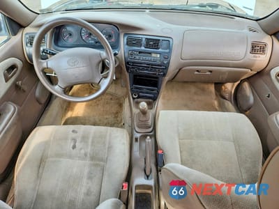 Zdjęcie 8 z 12 samochodu: 1997 TOYOTA COROLLA BASE VIN:1NXBA02E3VZ519828 - miniatura