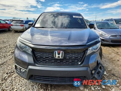Piąte zdjęcie samochodu w środku: 2021 HONDA PASSPORT EXL VIN:5FNYF8H50MB032261 - miniatura