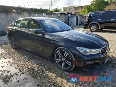 Czwarte zdjęcie samochodu z boku: 2018 BMW 750 XI VIN:WBA7F2C57JG423745 - miniatura