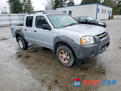Czwarte zdjęcie samochodu z boku: 2001 NISSAN FRONTIER XE VIN:1N6ED27Y31C309315 - miniatura