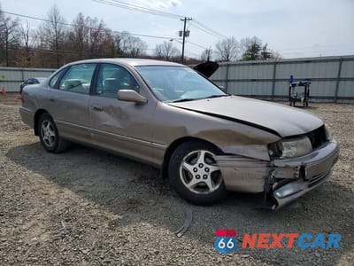 Czwarte zdjęcie samochodu z boku: 1999 TOYOTA AVALON XLS VIN:4T1BF18B3XU310306 - miniatura