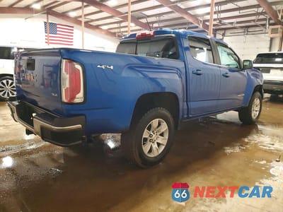 Trzecie zdjęcie samochodu z tyłu: 2018 GMC CANYON SLE VIN:1GTG6CEN5J1117989 - miniatura