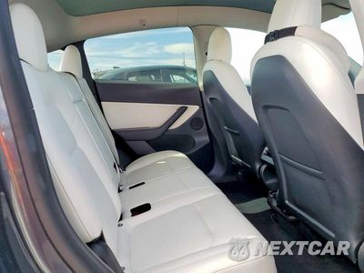 Zdjęcie 10 z 12 samochodu: 2022 TESLA MODEL Y VIN:7SAYGDEE3NF409650 - miniatura