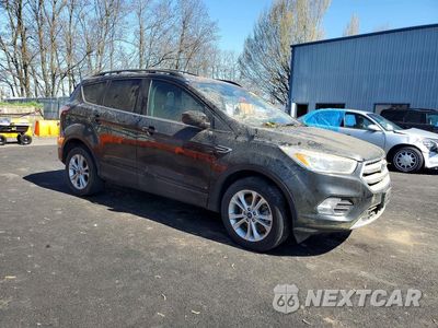 Czwarte zdjęcie samochodu z boku: 2018 FORD ESCAPE SE VIN:1FMCU9GD8JUA86811 - miniatura