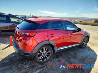 Trzecie zdjęcie samochodu z tyłu: 2016 MAZDA CX-3 GRAND TOURING VIN:JM1DKBD7XG0107081 - miniatura