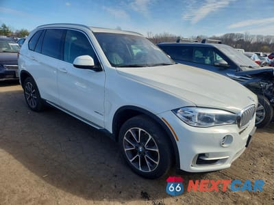 Czwarte zdjęcie samochodu z boku: 2016 BMW X5 XDRIVE35I VIN:5UXKR0C54G0U09052 - miniatura